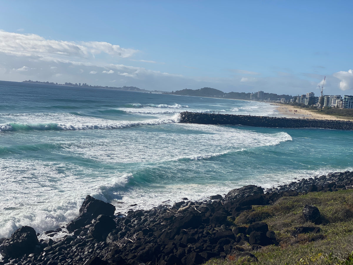 This photo was taken from Burleigh Heads National Park looking south over the break wall at Tallebudgera.