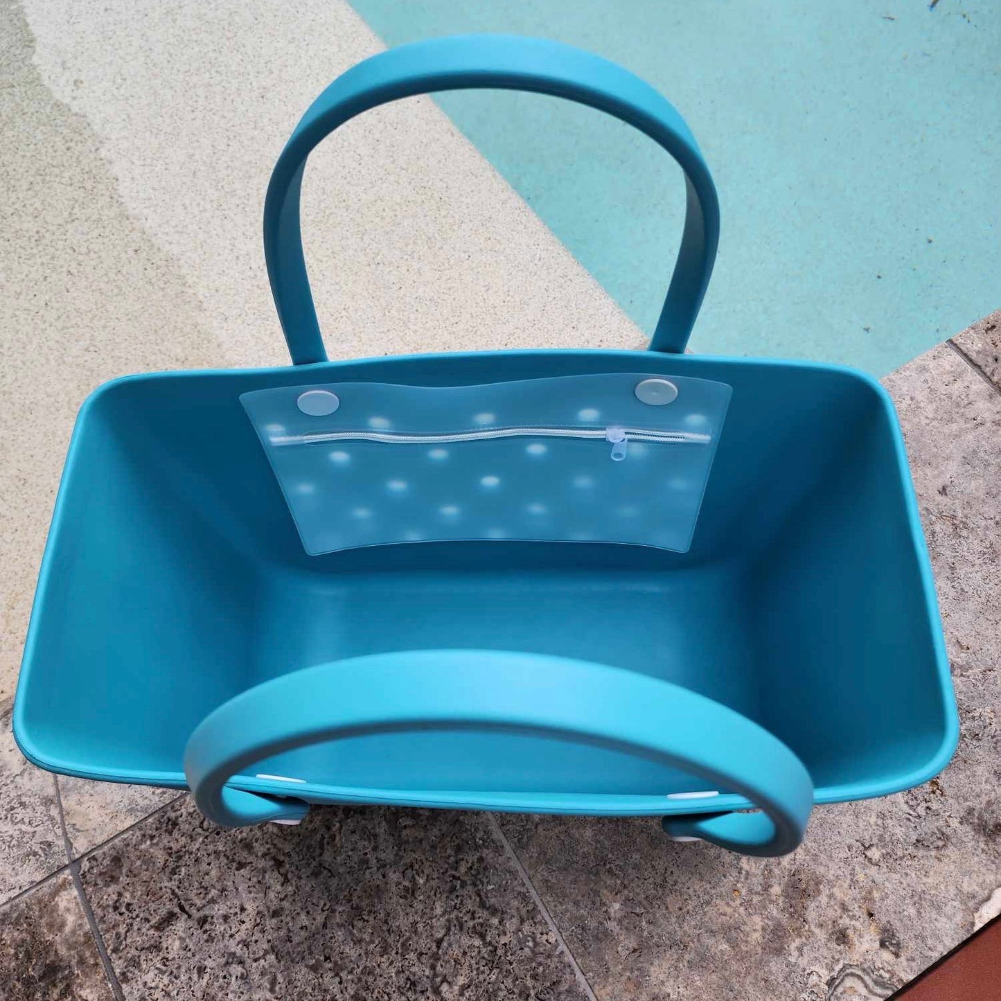 Aqua Marine Silicone Bag (One Size Fits All): Stylish & Functional for Beach Days. [Durable aqua marine silicone bag with a convenient side pocket sits open, ready to be filled with beach essentials.]