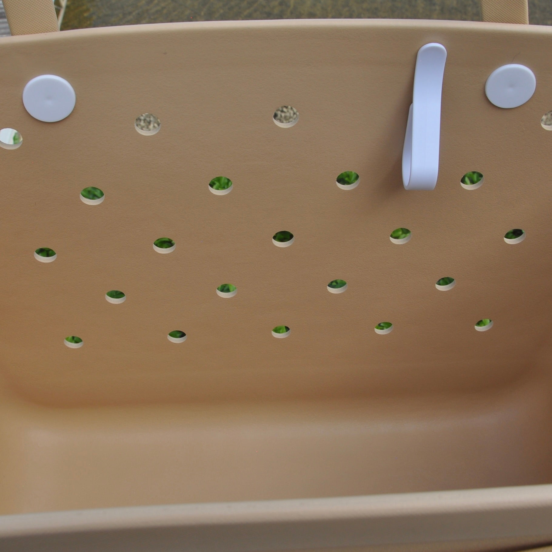 Sand Eva Silicone bag showing the clip for sunglasses keys etc.