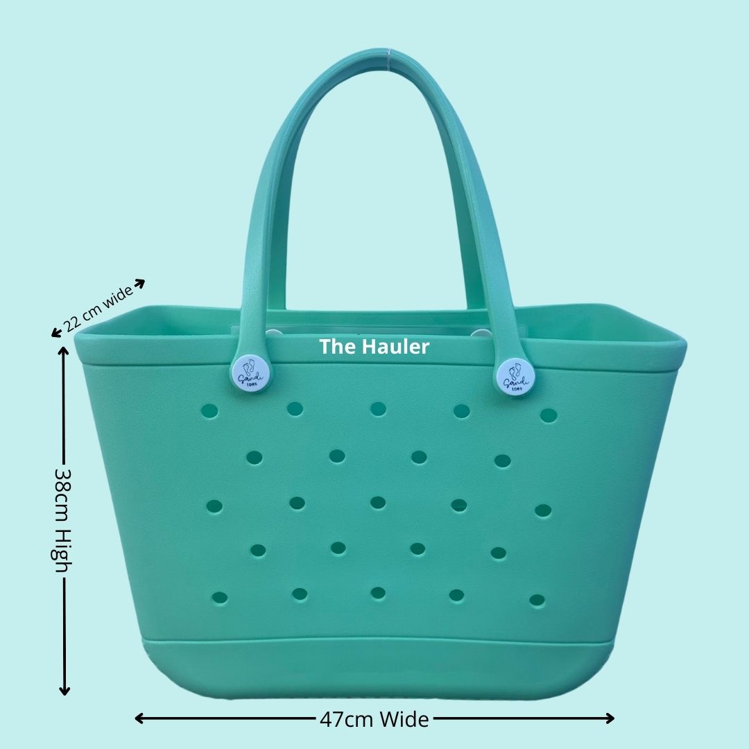 The Hauler Sea Foam Silicone Bag: Spacious & Functional. [Detailed size chart: Height 38cm, Width 47cm, Top Depth 22cm. Perfect for carrying all your beach essentials in style.]