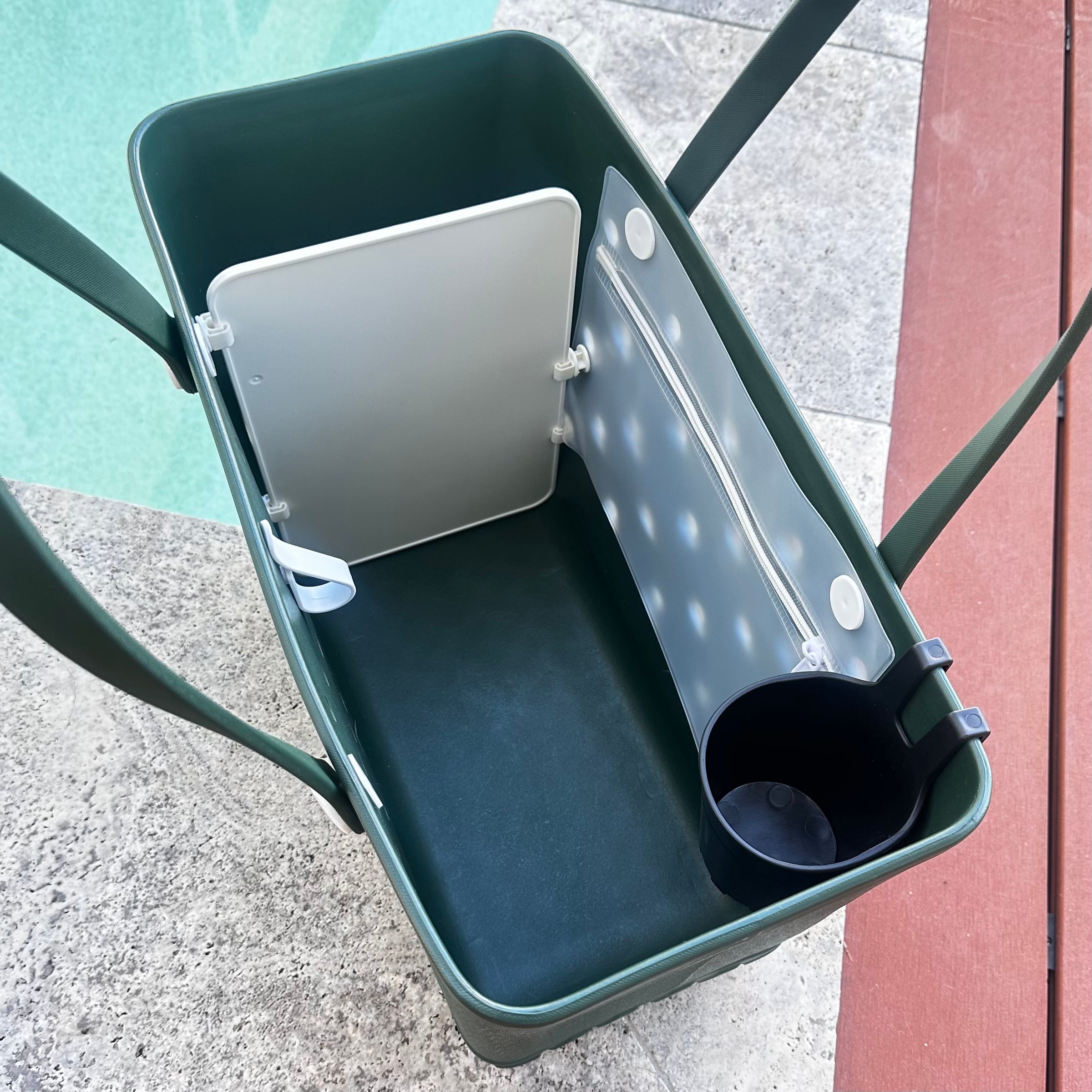 * "Sea Moss Eva Silicone bag showing insert and clip (included in every size), divider aftermarket accessory (for The Hauler only), and cup holder aftermarket accessory"