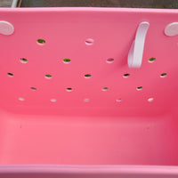 "Seashell Eva Silicone bag showing the clip for sunglasses keys etc."