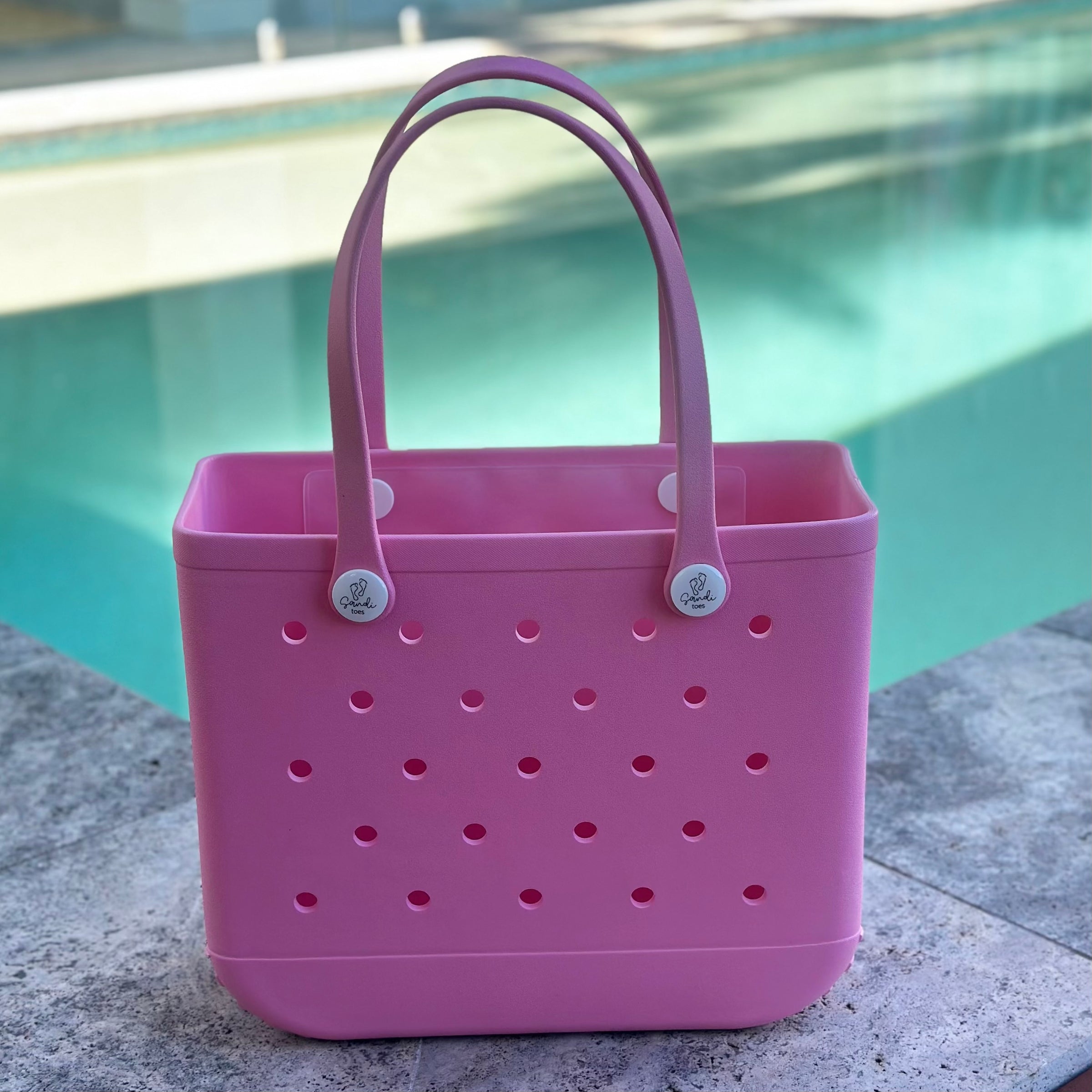 * "Medium Seashell EVA silicone beach tote bag front view displaying spacious interior and shoulder straps"