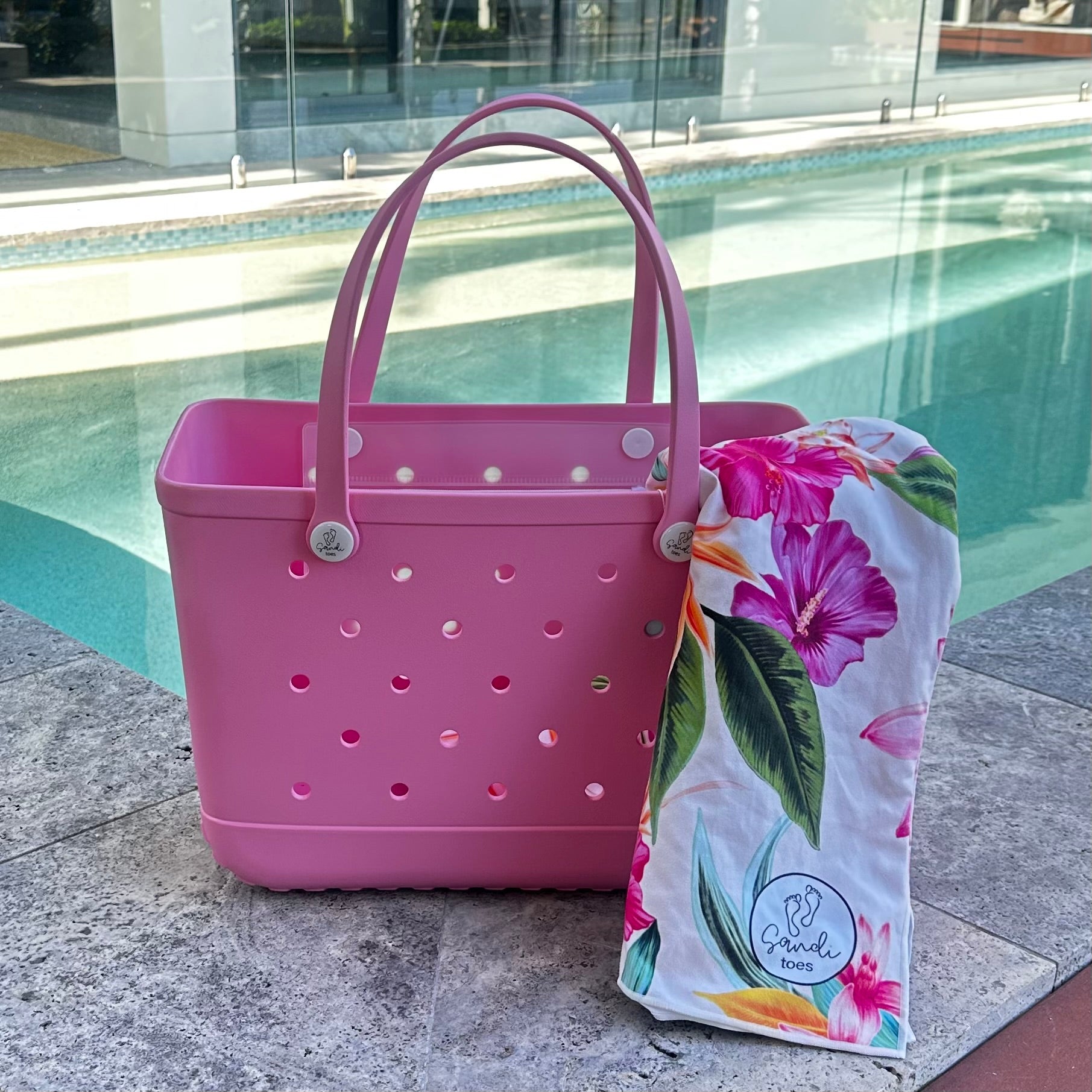 "Sea Foam Eva Silicone bag showing the a Island Princess Sand Free Hoodie for kids and adults"