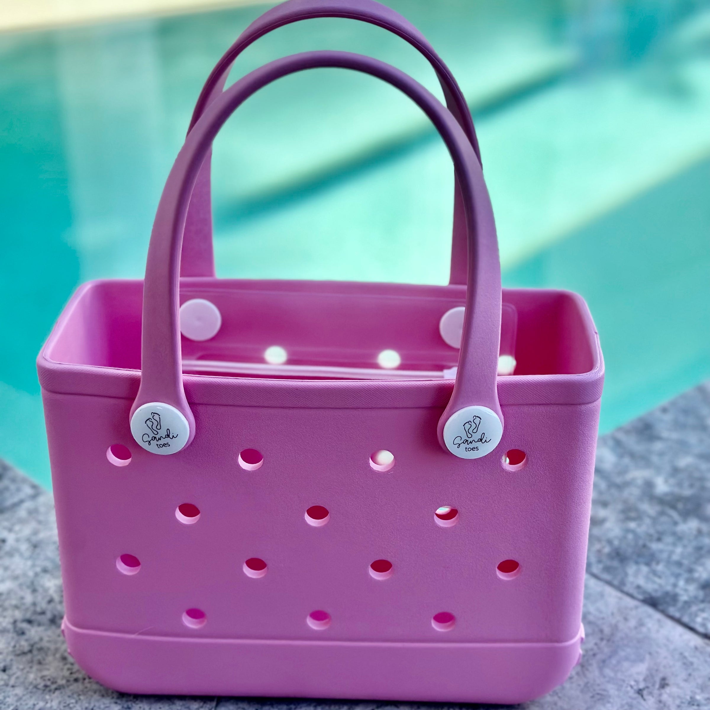 "Small Seashell EVA silicone beach tote bag front view showing compact size and handles"