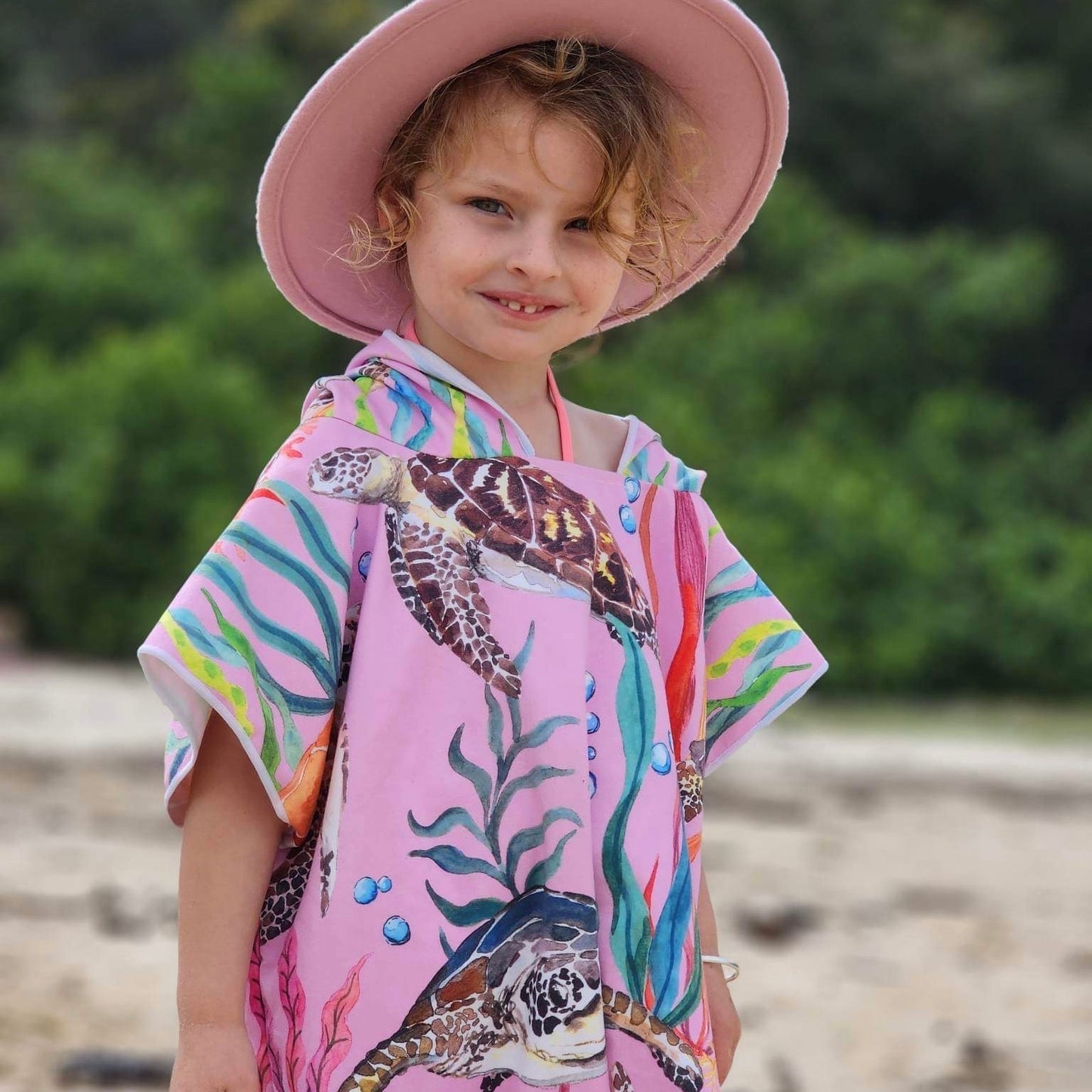Turtle Cove girl with a sun hat not included