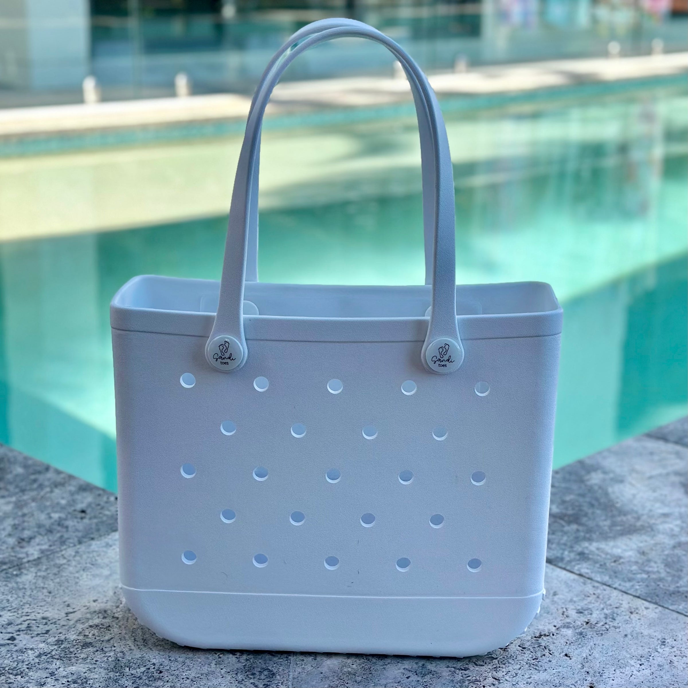 * "Medium White Haven EVA silicone beach tote bag front view displaying spacious interior and shoulder straps"