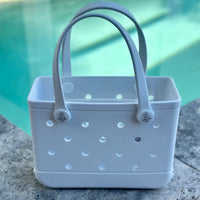 * "Small White Haven EVA silicone beach tote bag front view showing compact size and handles"