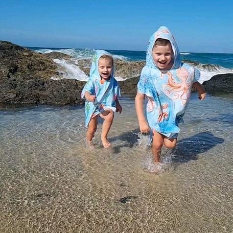 Two of my favourite models showing how fun it can be wading on the beach at Elephant Rock at Currumbin, seen here are Feeding Frenzy and Under the Sea popular designs