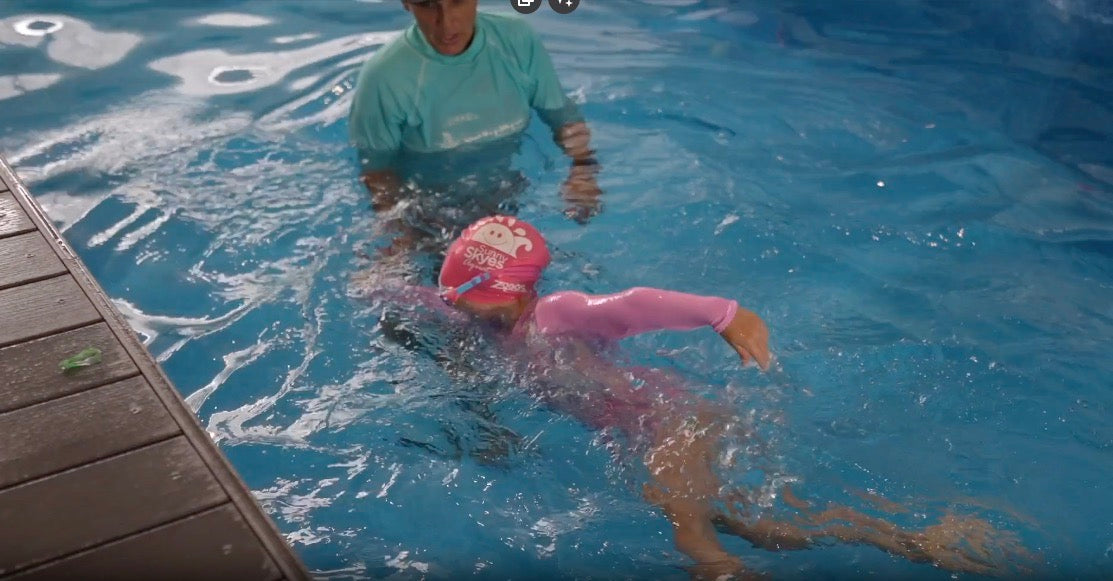 Learning to swim is a valuable life skill for kids of all ages! Sunny Skyes Aquatics in Burleigh Heads and Tallebudgera Rec Centre seen here is a 5 year old training under a qualified instructor at Burleigh Heads Centre