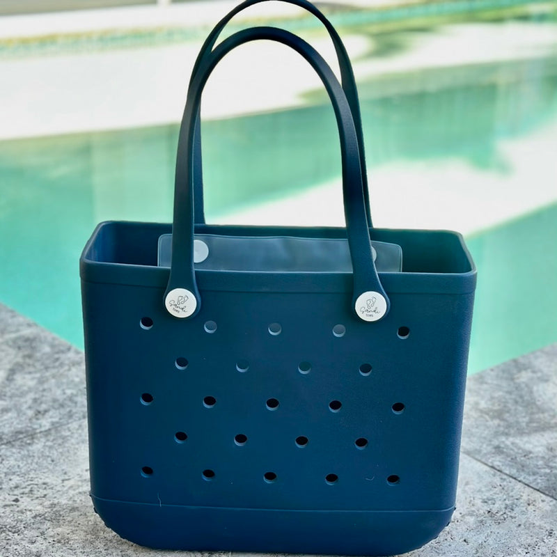 * "Medium Sailors Navy EVA silicone beach tote bag front view displaying spacious interior and shoulder straps"