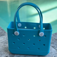  "Small Aqua Marine EVA silicone beach tote bag front view showing compact size and handles"
