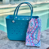  "Aqua Marine Eva Silicone bag showing the a Xalli Sand Free Hoodie for adults"
