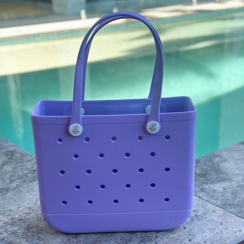 * "Medium Coral Cove EVA silicone beach tote bag front view displaying spacious interior and shoulder straps"