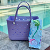 * "Coral Cove Eva Silicone bag showing the a Earth and Sea Sand Free Hoodie for kids."
