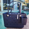 Sailors Navy Tote Bag with Silicone Cup holder and key clip beside a swimming pool
