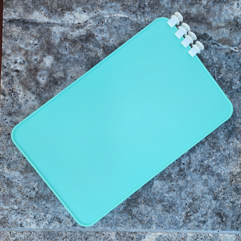 Sea Foam Bag Divider with clips on a concrete pool surface