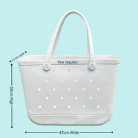 The Hauler White Haven Silicone Bag: Spacious & Functional. [Detailed size chart: Height 38cm, Width 47cm, Top Depth 22cm. Perfect for carrying all your beach essentials in style.]