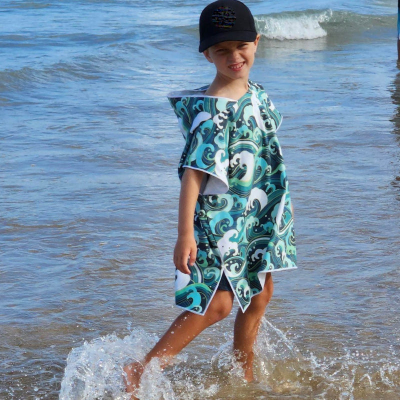 Boy on Currumbin Beach wearing a Medium Wipeout