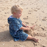 Toddler wearing ad to the bone sand free hoodie