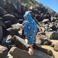 Bad to the bone large hoodie climbing on rocks