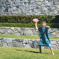 10 year old boy wearing bad o the bone hoodie playing football