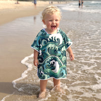 Toddler laughing wearing wipeout baby sand free hoodie